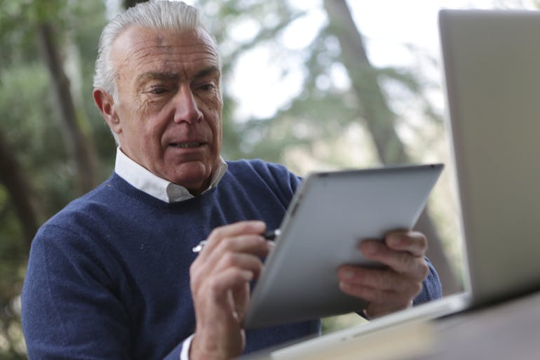 a man using his tablet